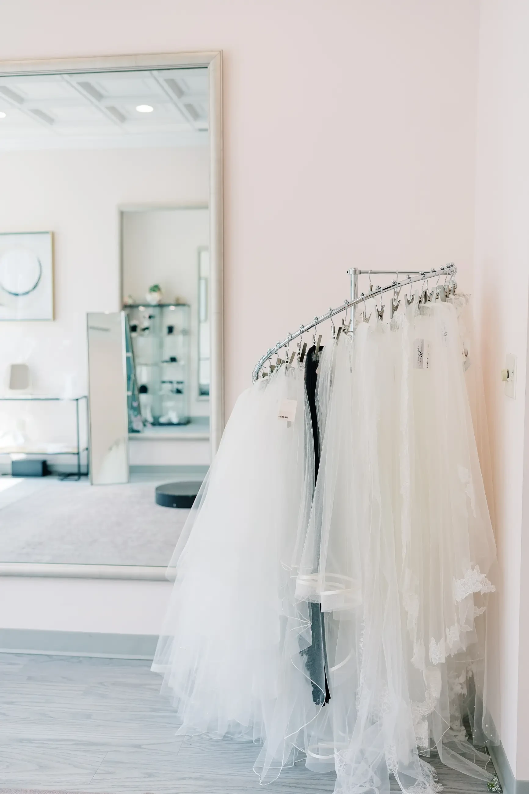image shows a rack of bridal veils