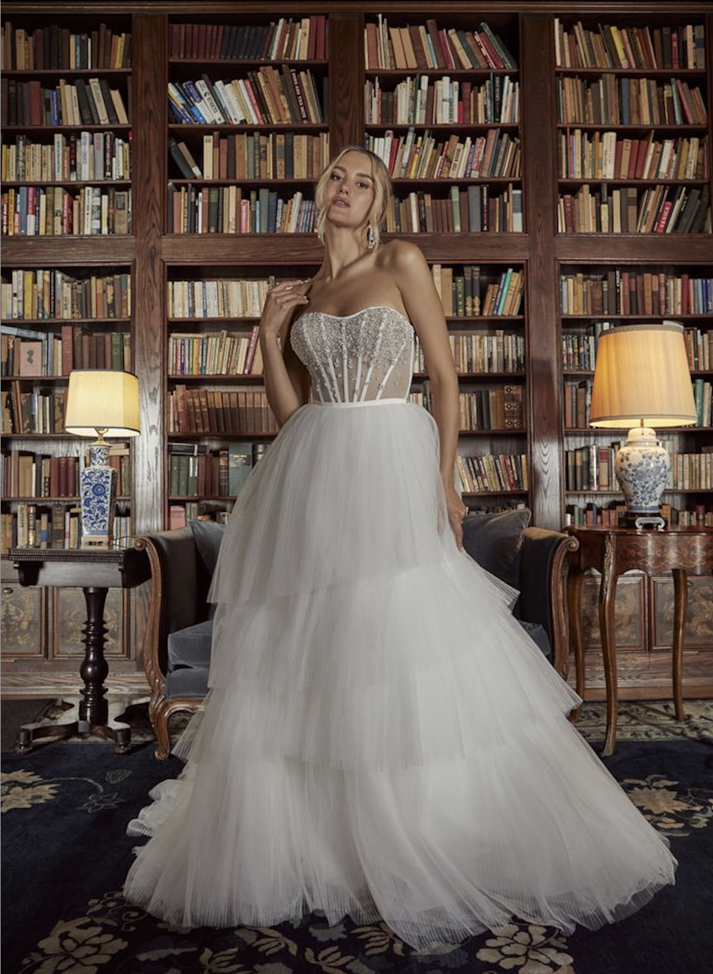 image shows a bride wearing a tulle ball gown inspired by taylor swift's speak now era