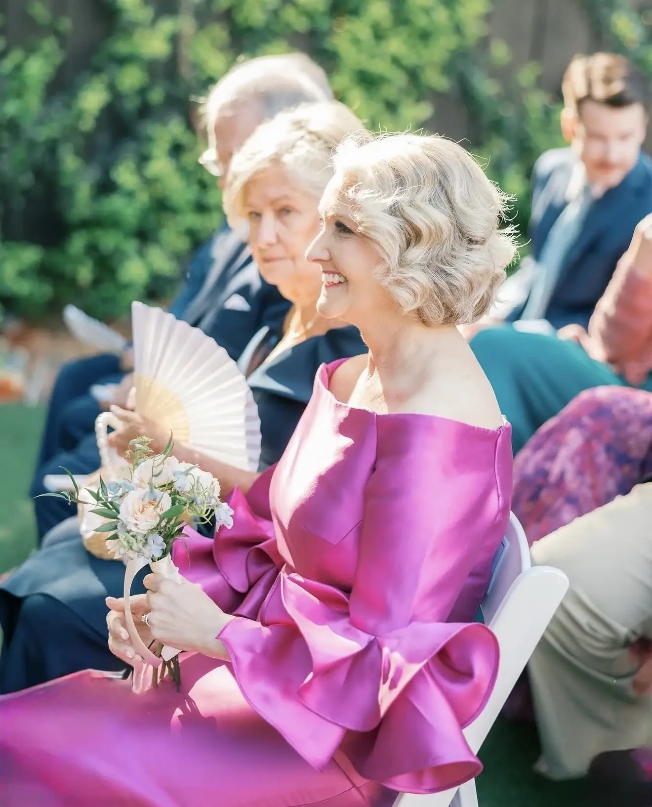 mother of the bride in magenta dress